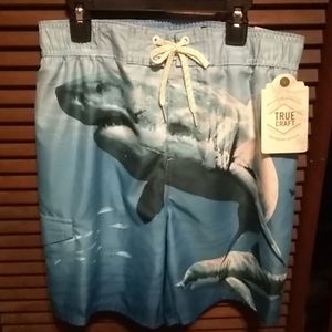 Blue Shark swim trunks, size large